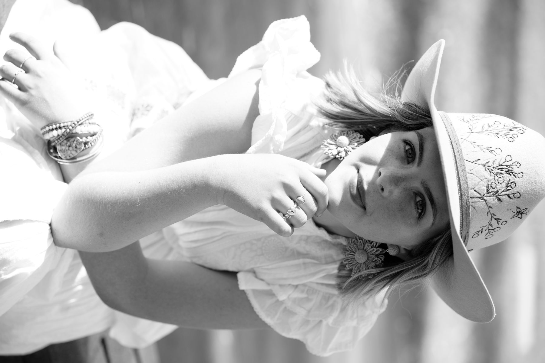 Ruby Holden smiling in cowboy hat black and white