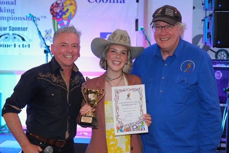 Ruby Holden at competition with group