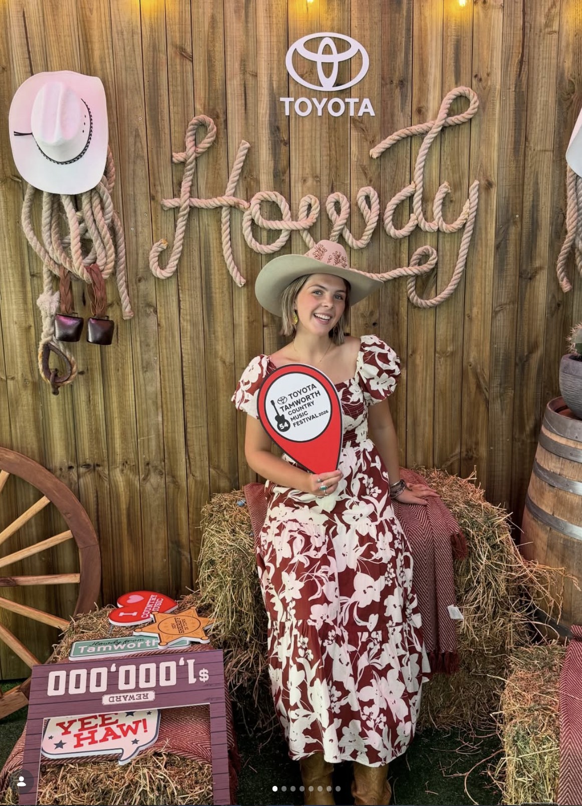 Ruby Holden with Howdy sign